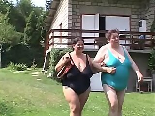 Mummy together with matured Plus-size lezzies lick their honeypots nearly away from an obstacle lagoon